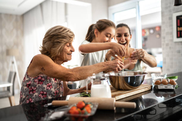 istock Multi generationg family baking together at home 1310584584