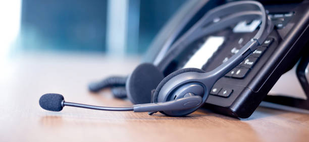 istock Communication support, call center and customer service help desk. VOIP headset for customer service support (call center) concept 1310588473