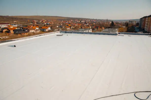 Photo of Flat roof with hot air welded pvc membrane waterproofing for ballasted system