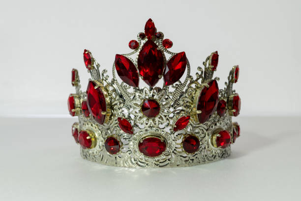 istock Crown on a white background, handmade, custom, individually, princess jewelry. Foreground. For girls. beautifully. fashion. Royal crown glistens