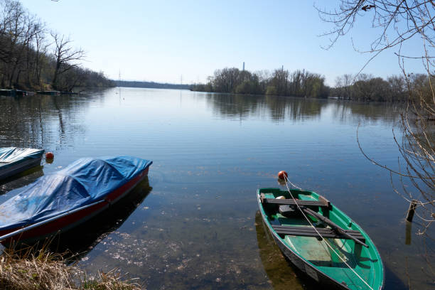 istock several boats in different colors are lying at a lake 1310595952
