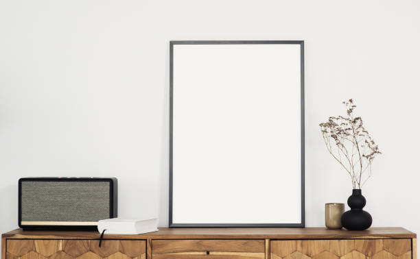 istock Blank picture frame mockup on white wall. Artwork showcase 1310597495