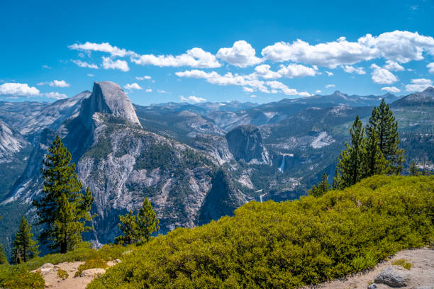 The nature of the Glacier point and in the background the Half Dome. Yosemite National Park, United States"t The nature of the Glacier point and in the background the Half Dome. Yosemite National Park, United States"t vernal utah stock pictures, royalty-free photos & images