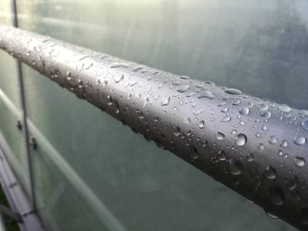 Drops of water on a railing after the rain