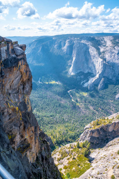 A young man at the top of Taft point in Yosemite National Park. United States"t A young man at the top of Taft point in Yosemite National Park. United States"t vernal utah stock pictures, royalty-free photos & images