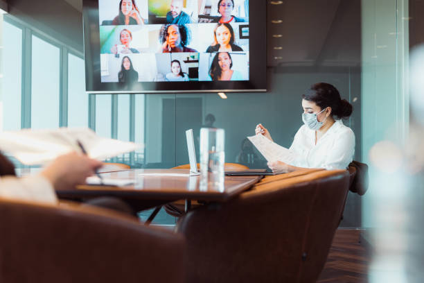 istock Businesspeople communicate via video conference 1310604565