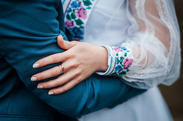 istock The bride is holding the groom's hand 1310606864