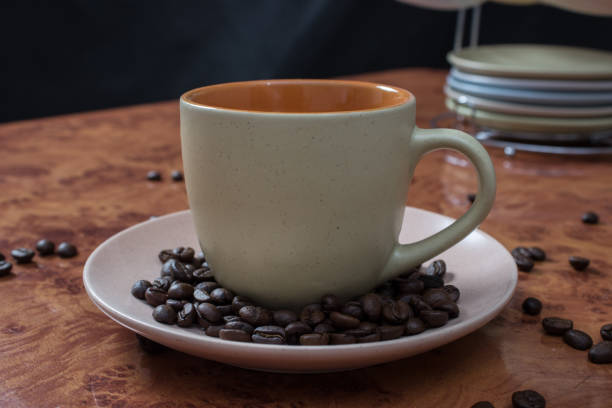 istock Cup of coffee and coffee beans 1310607206