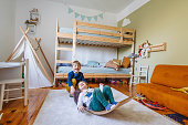Two little boys playing in their room