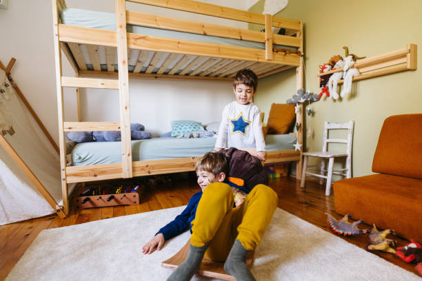 istock Two little boys playing in their room 1310607341