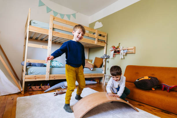 istock Two little boys playing in their room 1310607385