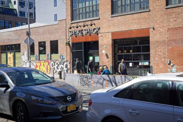 Shake Shack Brooklyn location Brooklyn, NY, USA - Apr 3, 2021: Shake Shack restaurant with outside dining on Berry Street in Williamsburg warren street brooklyn stock pictures, royalty-free photos & images