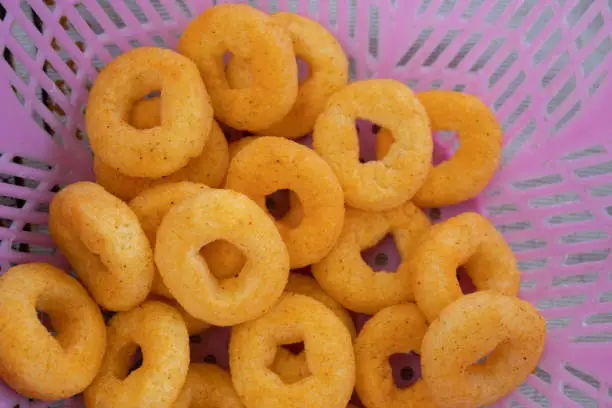 Photo of Closeup shot of Fryums in a bowl