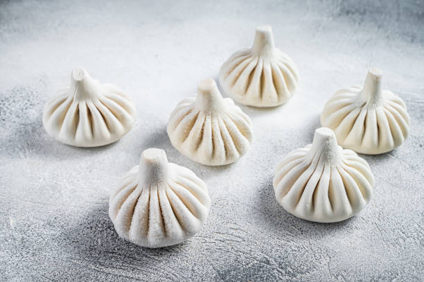 istock Georgian Raw dumpling Khinkali with meat. White background. Top view 1310610905