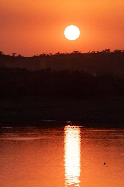 istock Reflection of sun in the water 1310611035