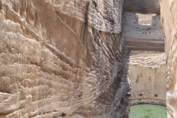 View of the Adi Kadi Vav step well inside the Uparkot Fort in Junagadh, Gujarat, India View of the Adi Kadi Vav step well inside the Uparkot Fort in Junagadh, Gujarat, India junagadh stock pictures, royalty-free photos & images