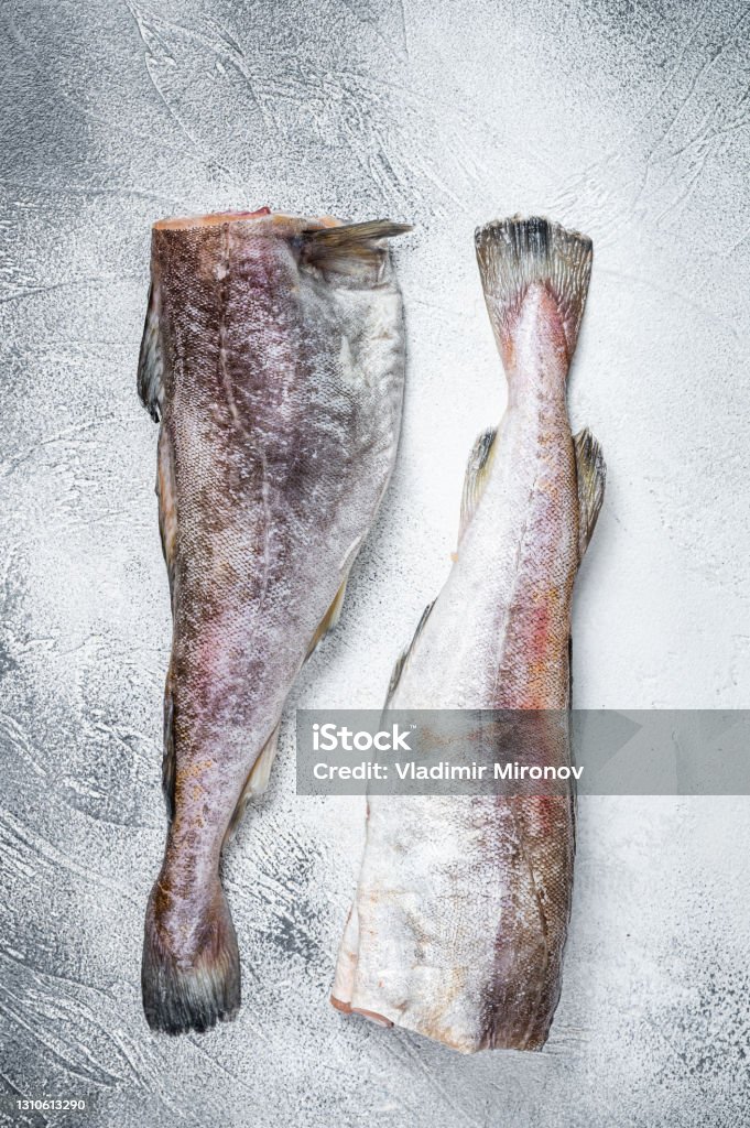Cod Fish From Top Raw Cod Whole Fish On Kitchen Table White Background Top View Stock ...