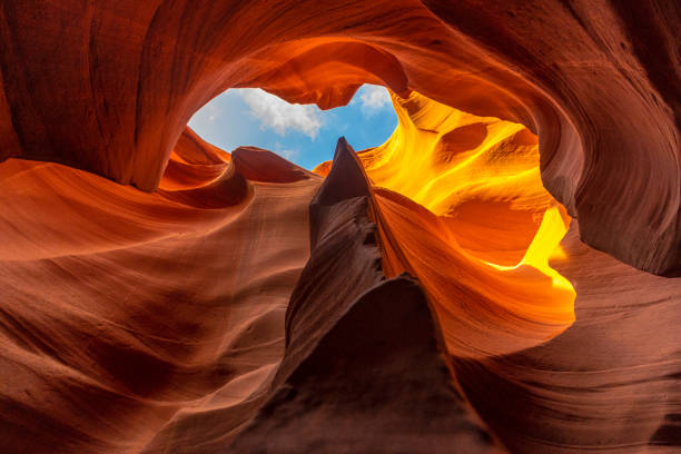 A beautiful arch with a mixture of red, orange and purple curves in Lower Antelope, Arizona. United States, vertical photography"t A beautiful arch with a mixture of red, orange and purple curves in Lower Antelope, Arizona. United States, vertical photography"t antelope canyon stock pictures, royalty-free photos & images