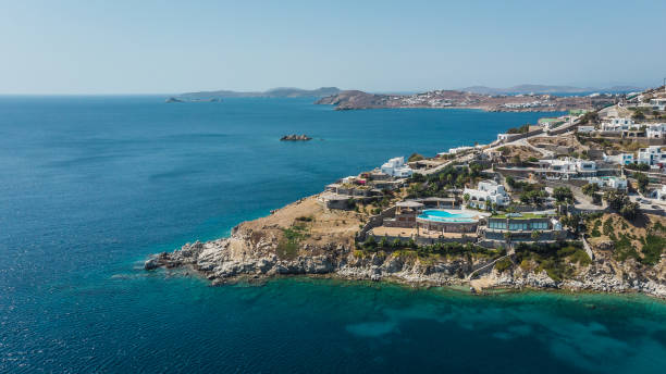 Aerial view of Psarou bay and villas. stock photo