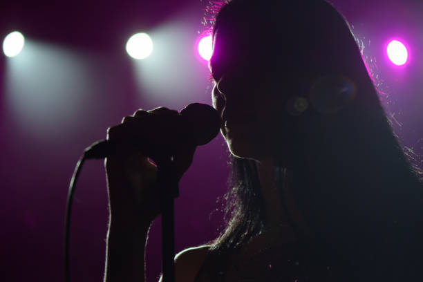 istock Close up image of live singer on stage. 1310628364