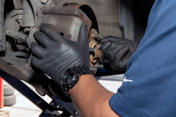 istock Team members involved in repairing your vehicle. 1310631509