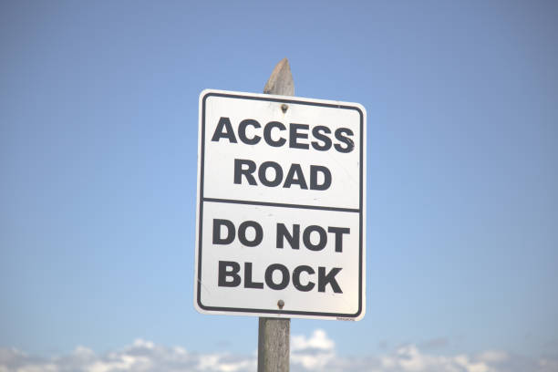 istock Road access sign do not block 1310633572