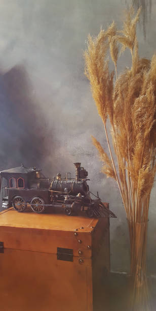 Dried flowers still life with train