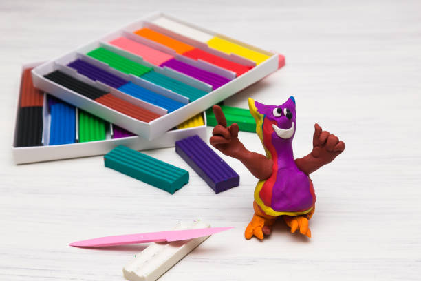 istock plasticine figurine resembling a cat on a light background 1310634416