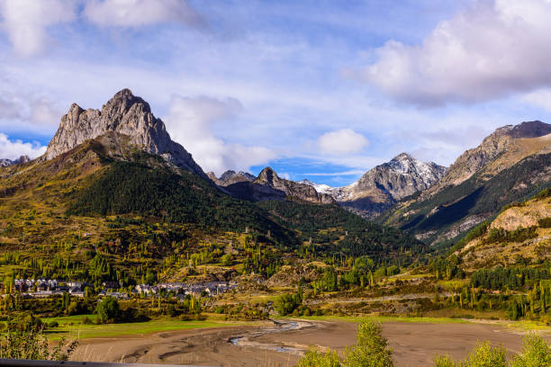 View of the Tena valley with the town of Sallent de Gallego under the Foratata peak (2341 m), Aragon, Spain.