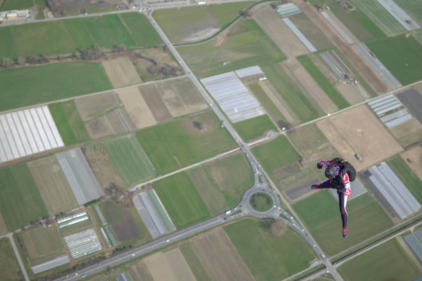 istock Freefall jumper soars above Swiss mountain landscape 1310636893