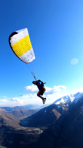istock Parasailer soars above Swiss mountain landscape 1310637507