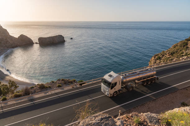 istock Tank truck driving on a mountain road 1310641818