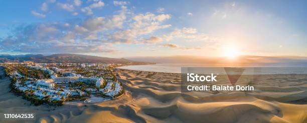 Landscape With Maspalomas Town And Golden Sand Dunes At Sunrise Stock Photo - Download Image Now