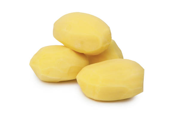 istock Raw peeled potato isolated on white background 1310642955