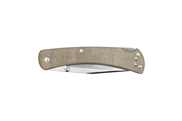 Pocket folding knife isolate on white background. Compact metal sharp knife with a folding blade. Pocket folding knife isolate on white background. Compact metal sharp knife with a folding blade. switchblade stock pictures, royalty-free photos & images