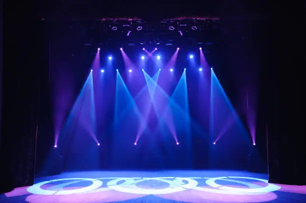 Photo of Free stage with lights, lighting devices on the consert.