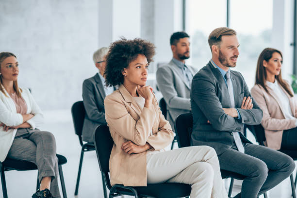 istock Business persons having a training class in a board room. 1310644006