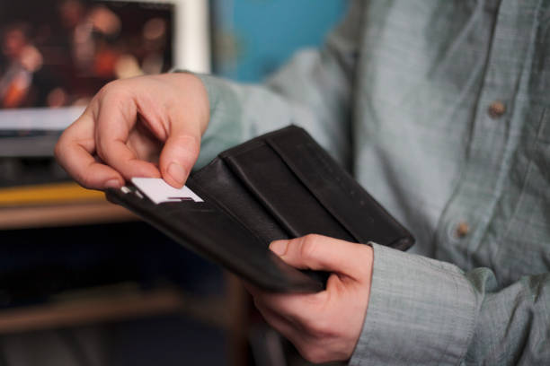 istock Man payment with credit card 1310645480