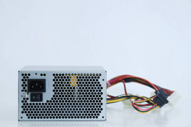 istock Power supply and wires for personal computer close-up. White background. 1310647565