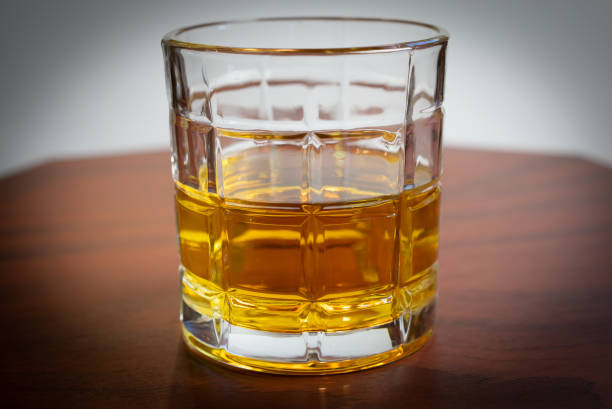 istock a drink with a drink with golden whiskey or beer 1310647578