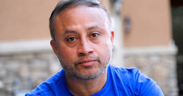 istock Serious pensive mature hispanic man looking at the camera 1310655146