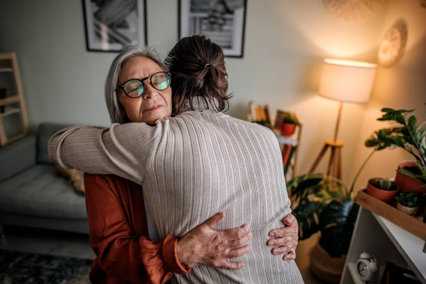 Emotions Son in visit to his mother mercy hug stock pictures, royalty-free photos & images