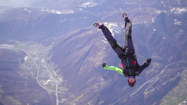 istock Freefall jumper soars above Swiss mountain landscape 1310658075