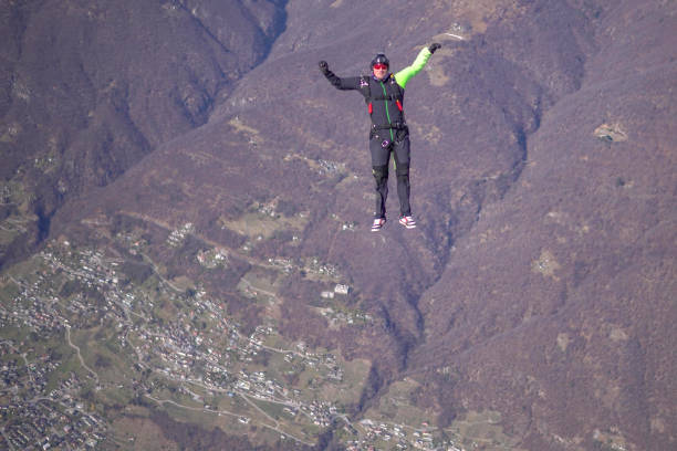 istock Freefall jumper soars above Swiss mountain landscape 1310658088