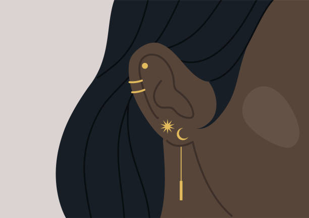 illustrations, cliparts, dessins animés et icônes de une fin vers le haut de l’image d’une oreille percée de femme avec des boucles d’oreilles d’or de différentes formes, un ensemble moderne de bijoux - perching