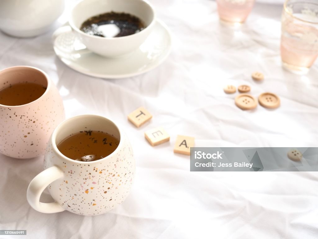Afternoon Tea Afternoon tea shot on a bright white cloth Afternoon Tea Stock Photo