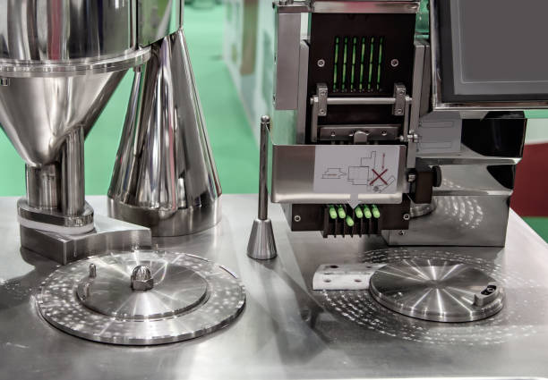 istock Capsule counting and filling machine 1310672325