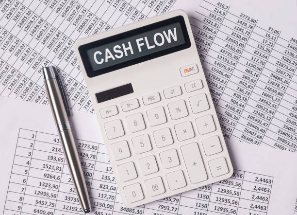 Cash flow word on calculator, cashflow inscription Cash flow word on calculator, cashflow inscription. cash flow photos stock pictures, royalty-free photos & images