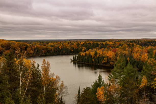 istock Cloudy Highbanks View During Autumn Over The Ausable River Cooke Dam Pond 1310674582