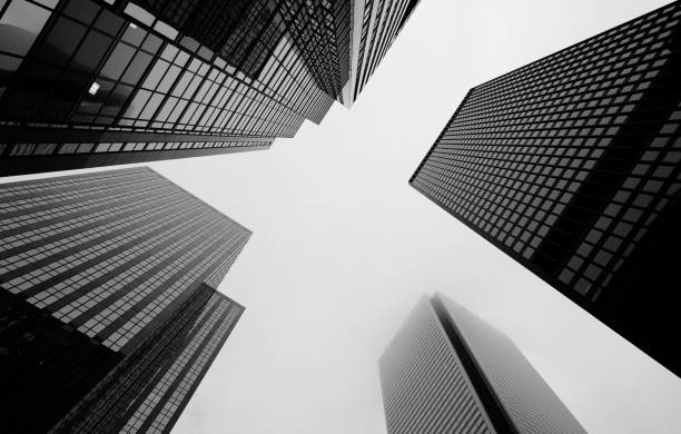 A set of four towers shooting up in the sky.